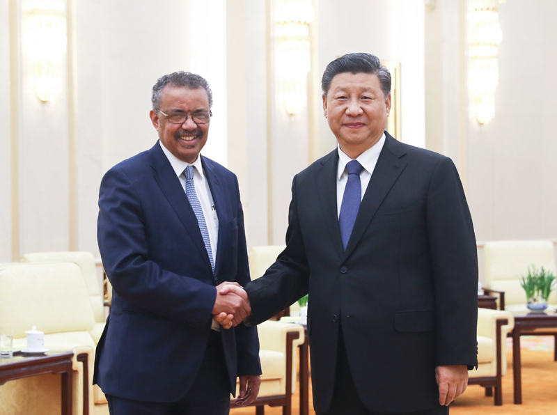习近平会见世界卫生组织总干事谭德塞